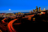 City's first spring morning - folks heading to work and super moon heading to Olympics under clear blue skies.